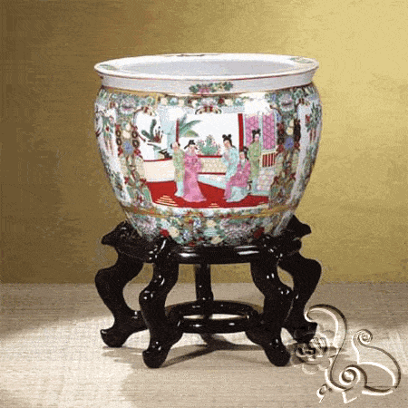 شلال بديكور صخري طبيعي مع زراعة زهرية محيطة