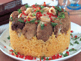 مقلوبة القرنبيط بثمار البحر