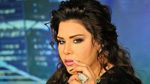 أحلام تحمل حقيبة ب 10 آلاف دولار