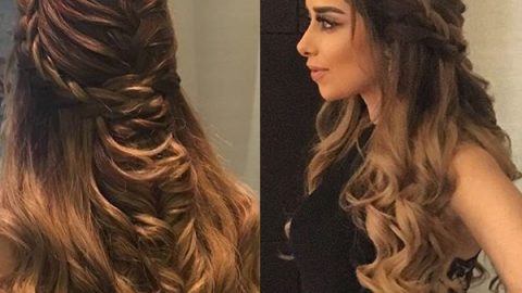 بلقيس فتحي بتسريحة شعر مموجة مع جديلة أنيقة