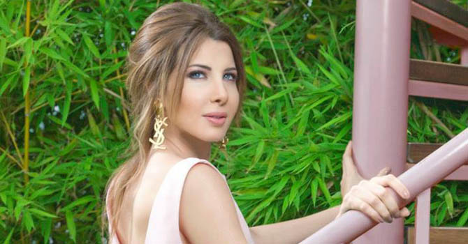 نانسى عجرم بظلال الباستيل فى ألبومها الجديد