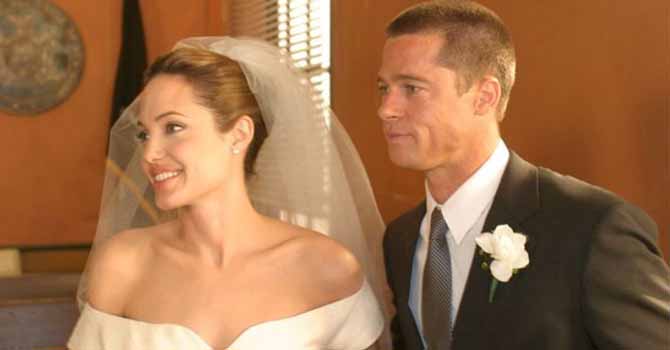 أنجلينا جولي وبراد بيت بوشم متطابق بمناسبة الزواج