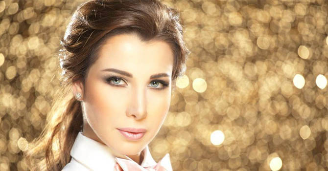 نانسي تشكر جمهورها وألبومها يتصدر iTunes