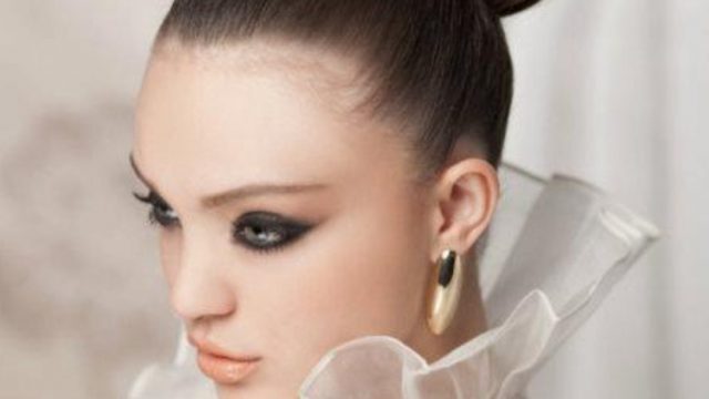 تسريحة الكعكة السميكة المرتفعة لعروس 2015
