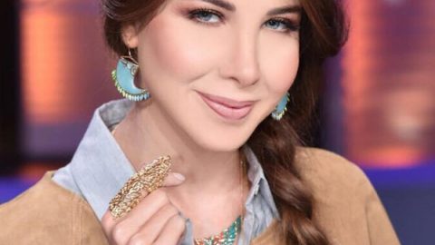 نانسي عجرم بتسريحة الجديلة الجانبية مع مكياج نيود