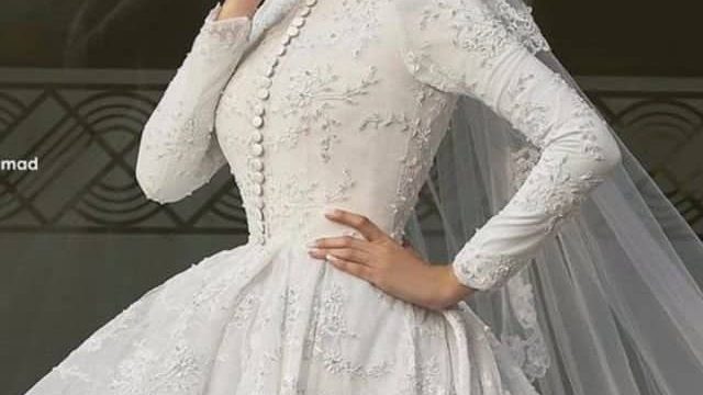 بالصور: فساتين زفاف محتشمة لإطلالة ملكية